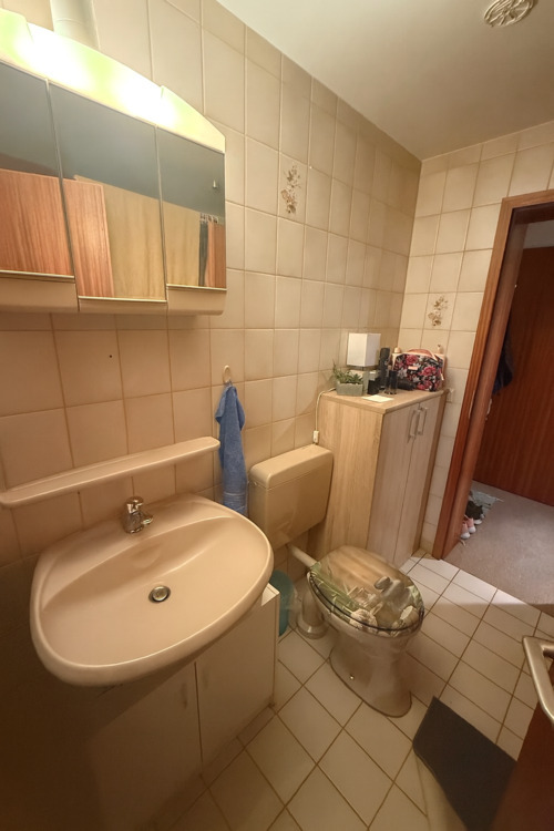 Gepflegte 2,5-Zimmerwohnung mit EBK, Balkon, großer Terrasse und Garten in bevorzugter Lage