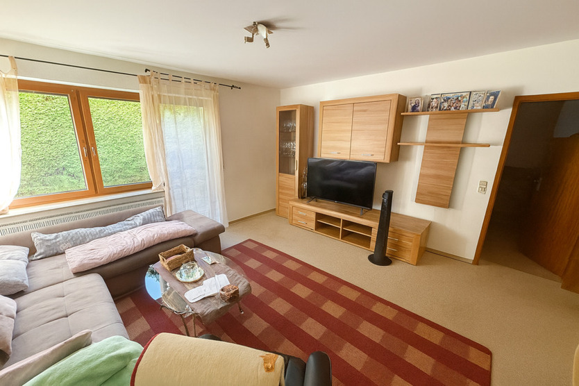 Gepflegte 2,5-Zimmerwohnung mit EBK, Balkon, großer Terrasse und Garten in bevorzugter Lage