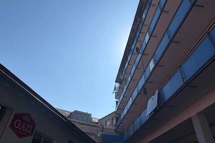 GewerbeImmobilie mit zwei Einheiten im Mehrfamilienhaus - solide vermietet & vielseitig nutzbar