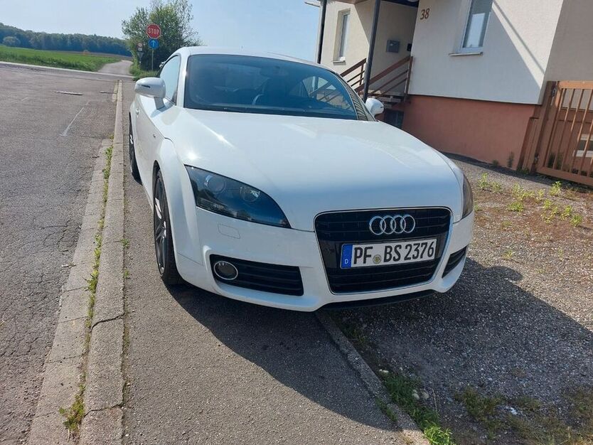 TT