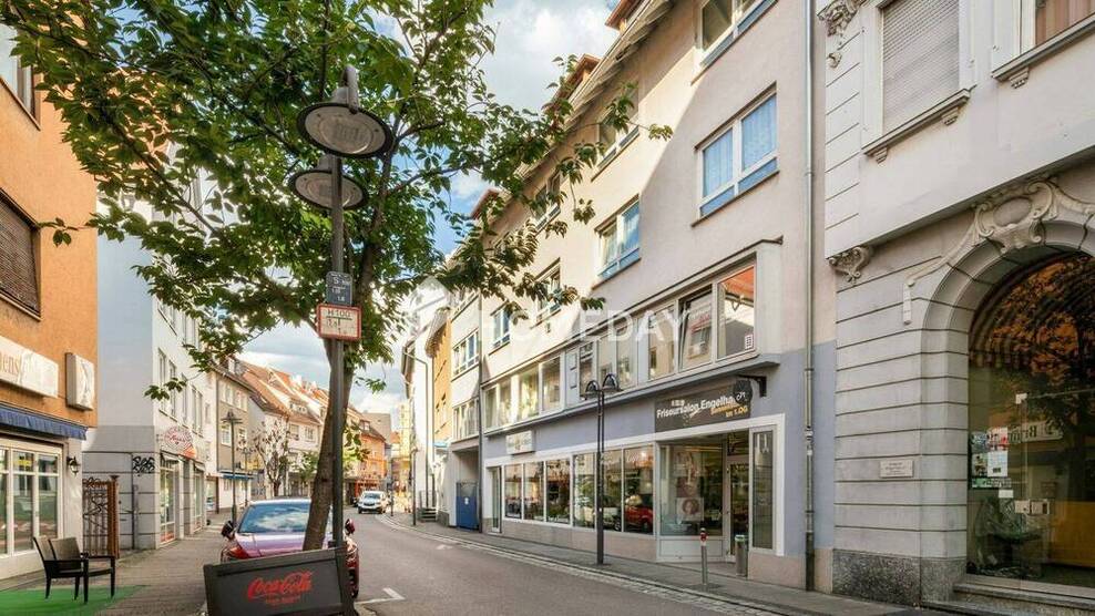 Lichtdurchflutete Dachgeschoßwohnung mit 3 Zimmern in ruhiger Zentrumslage