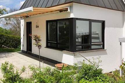 Attraktives Mehrfamilienhaus mit Kamin, Garten und flexiblem Nutzungskonzept 6 zimmer