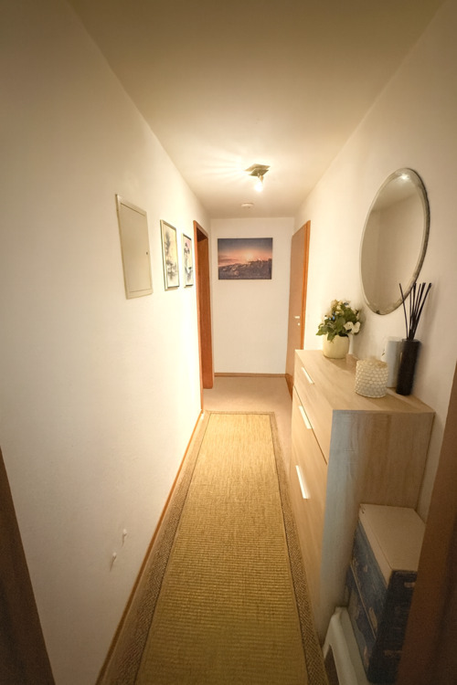 Gepflegte 2,5-Zimmerwohnung mit EBK, Balkon, großer Terrasse und Garten in bevorzugter Lage
