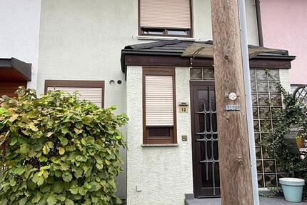 Charmantes Reihenmittelhaus mit Garten & Terrasse in Top-Lage von zimmer