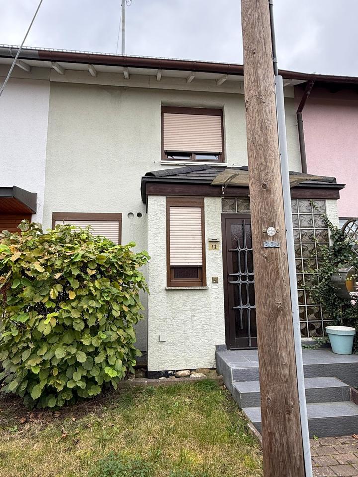 Charmantes Reihenmittelhaus mit Garten & Terrasse in Top-Lage von zimmer