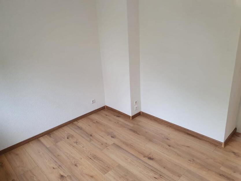 Lichtdurchflutete 4-Zimmer-Wohnung mit großem Balkon & Garage