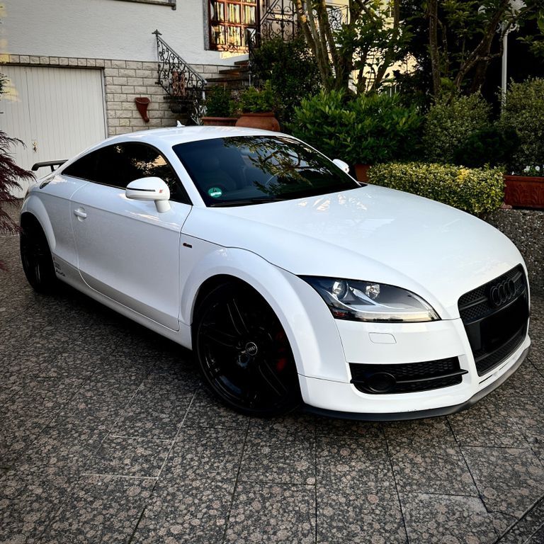 TT