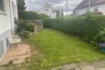 3,5 Zimmerwohnung mit großem Gartenanteil + extra Zimmer im UG + Garage